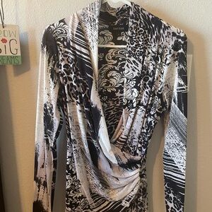 This is beautiful on. Stretchy fit.  Very flattering.